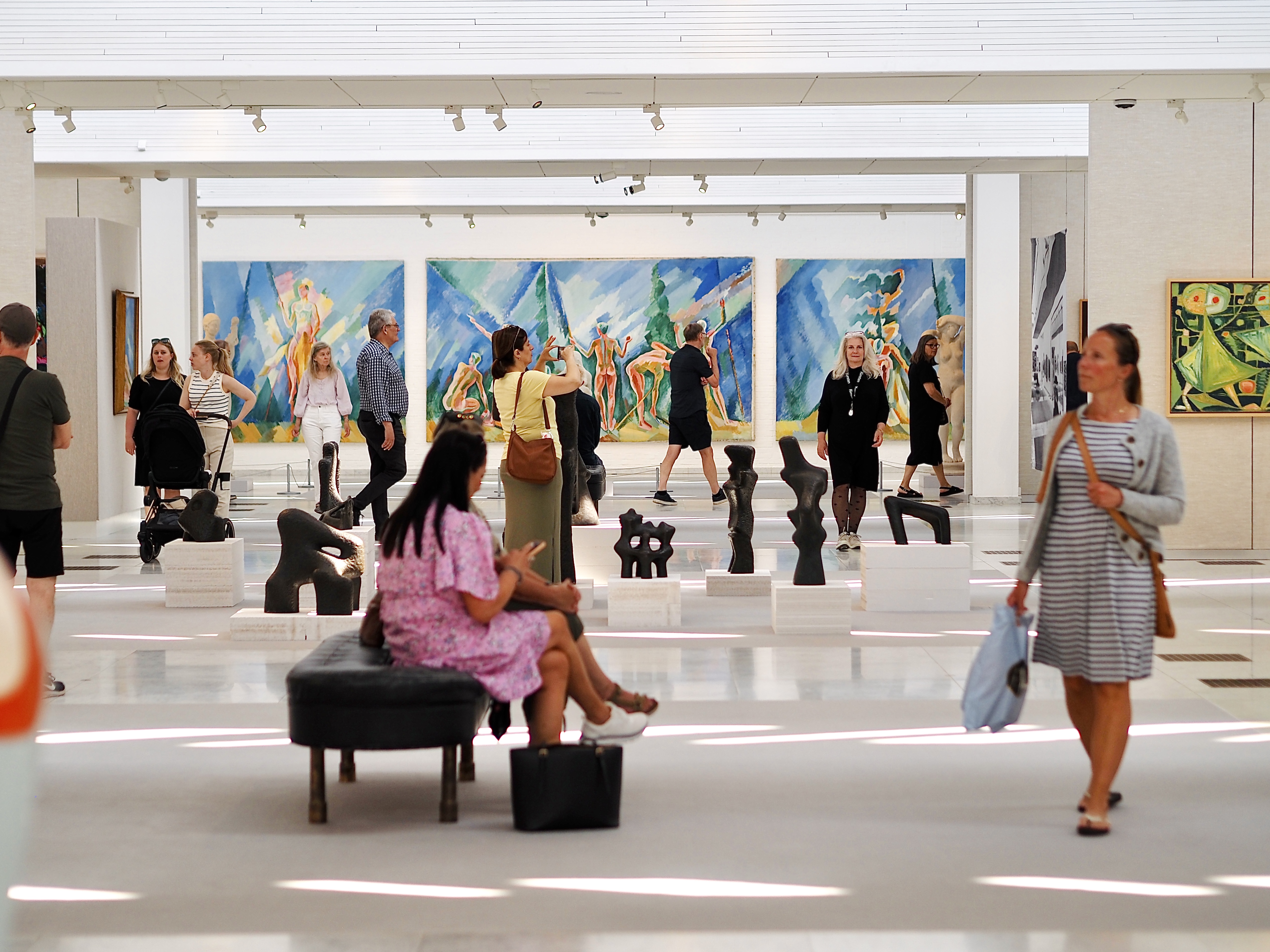 People walking around in the museum exhibition