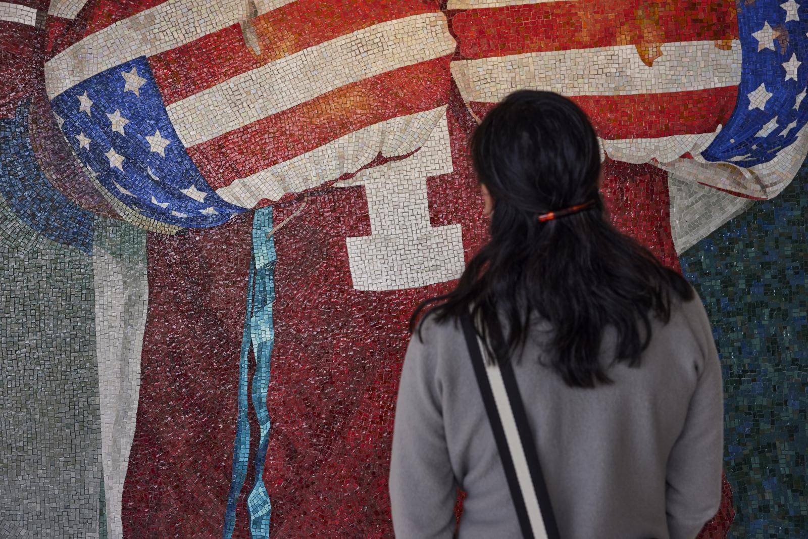 Woman looking at artwork